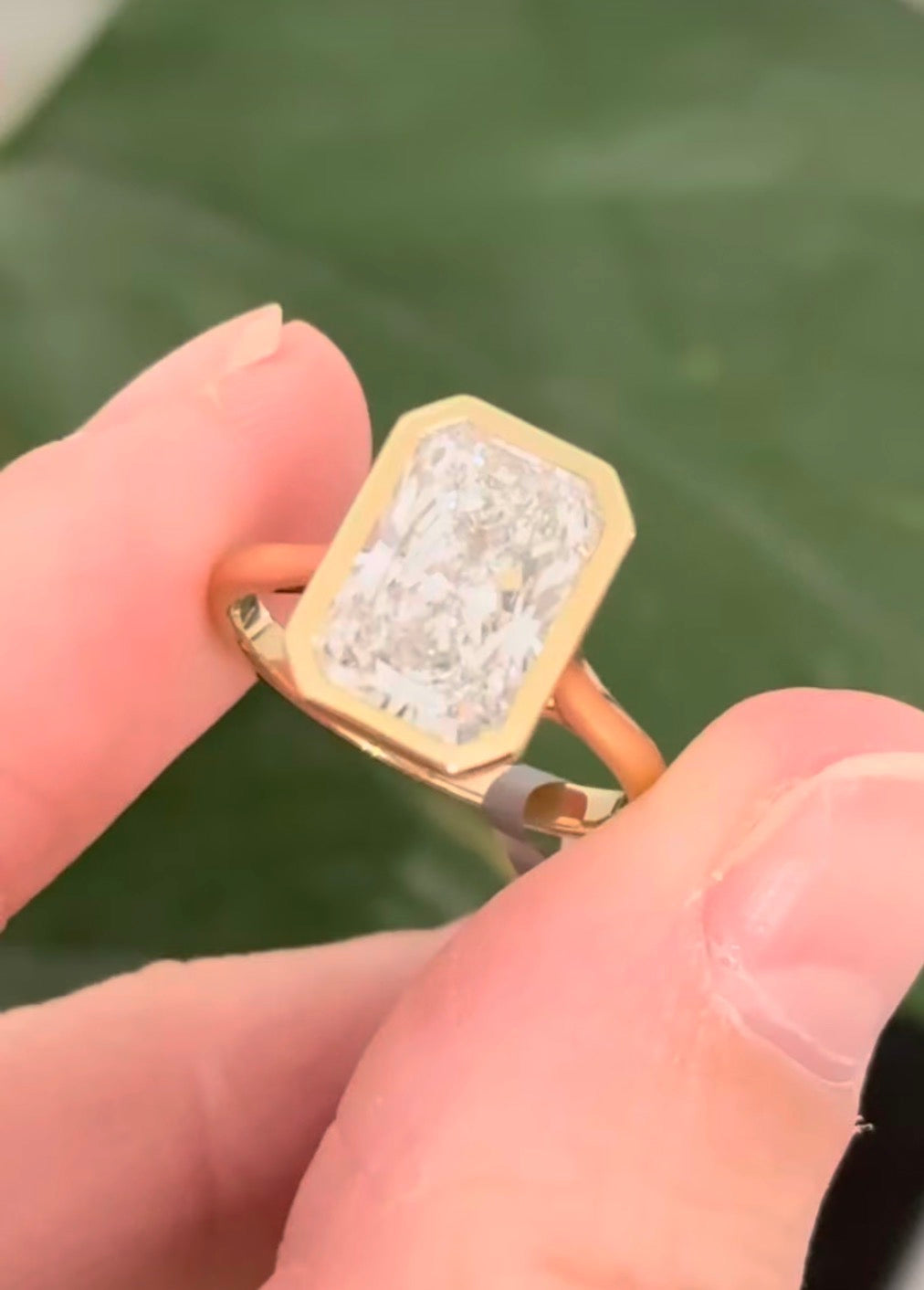 Yellow gold bezel set 3.99ct radiant lab diamond ring