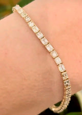 Yellow gold east west set 6.88ct emerald cut natural diamond bracelet