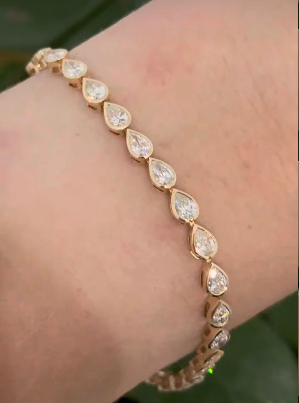 Yellow gold bezel set 5.28ct pear shape natural diamond bracelet
