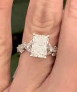 White gold radiant, marquise and round lab diamond ring. Center stone is 3.06cts E VS1 and measures 9.7x6.6mm