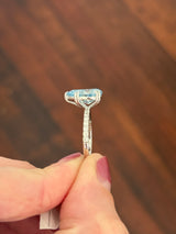 White gold pear shape blue lab diamond and white lab diamond ring
