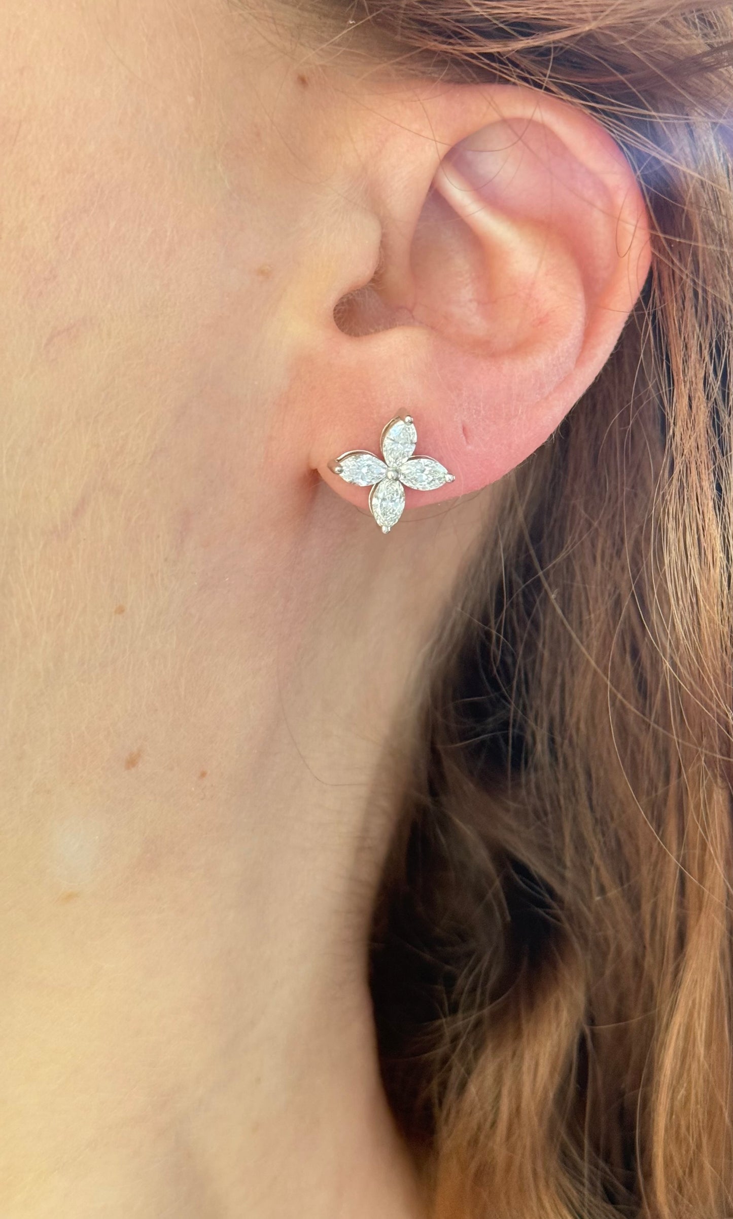 White gold flower stud earrings with marquise lab diamonds and push backs