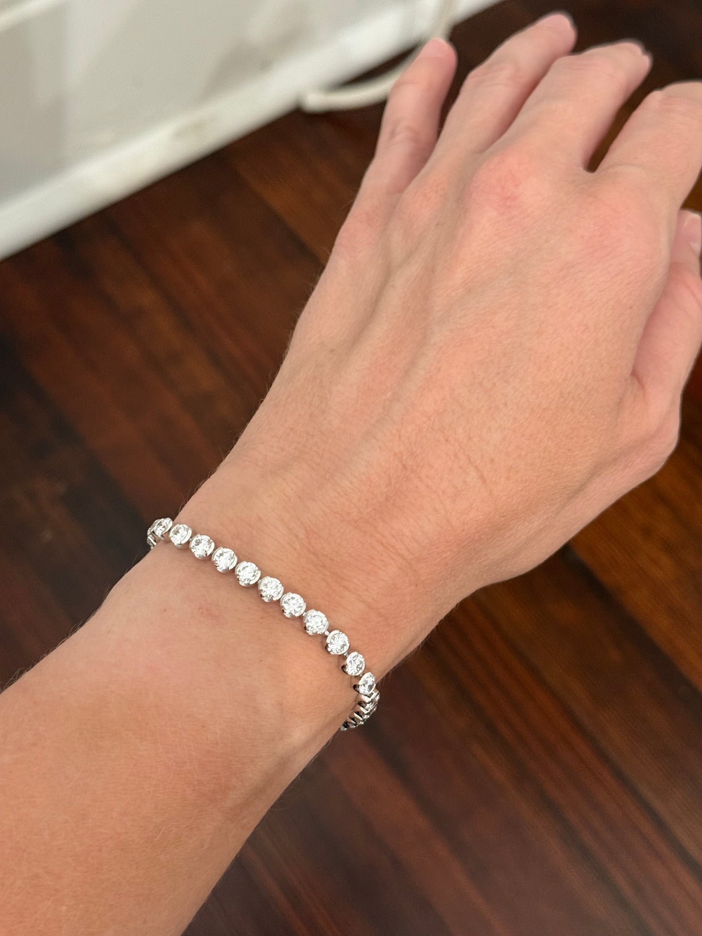 White gold half bezel set 9.74ct lab diamond bracelet