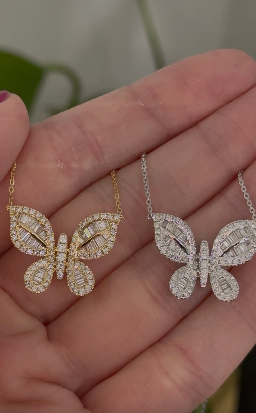 Butterfly necklaces with baguette and round diamonds available in white and yellow gold