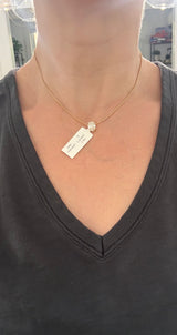 Yellow gold IGI certified 2.22ct oval lab diamond pendant. Can be worn east west and north south.