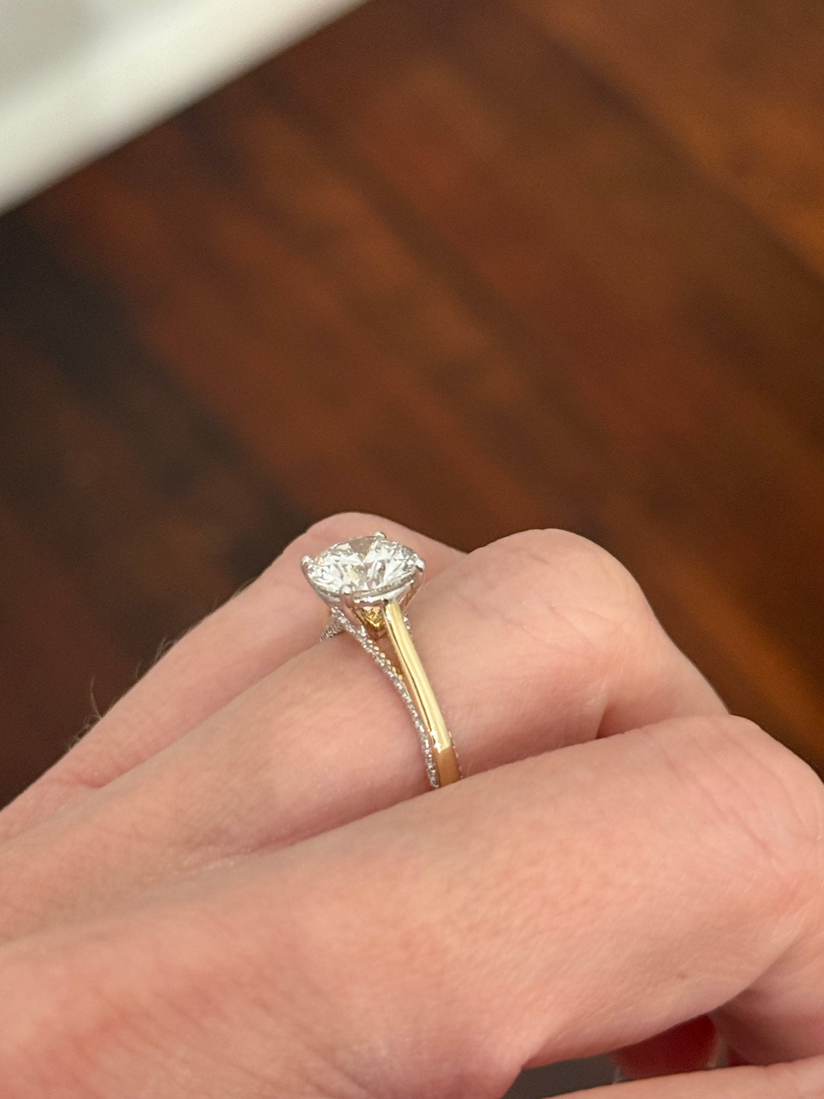 Yellow gold lab diamond ring. Lab diamonds are set in white gold.