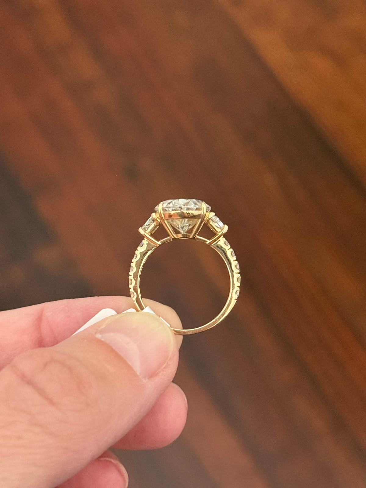 IGI certified oval and trapezoid and round lab diamond ring. Center stone is 6.52cts