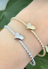 0.67ct natural diamond heart flex bracelets available in white and yellow gold