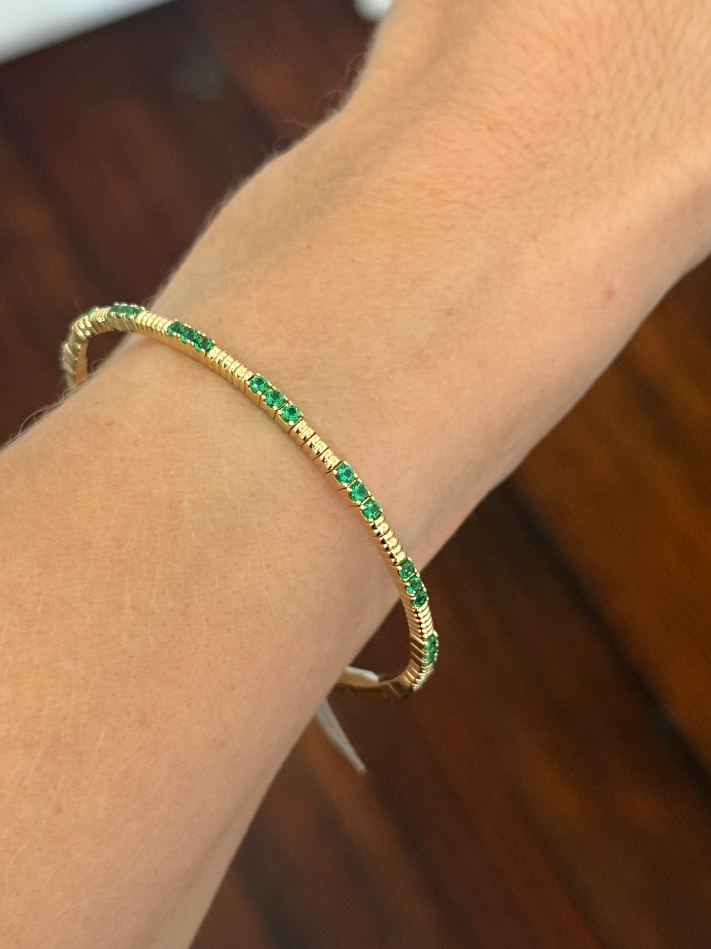 Yellow gold emerald flex bracelet