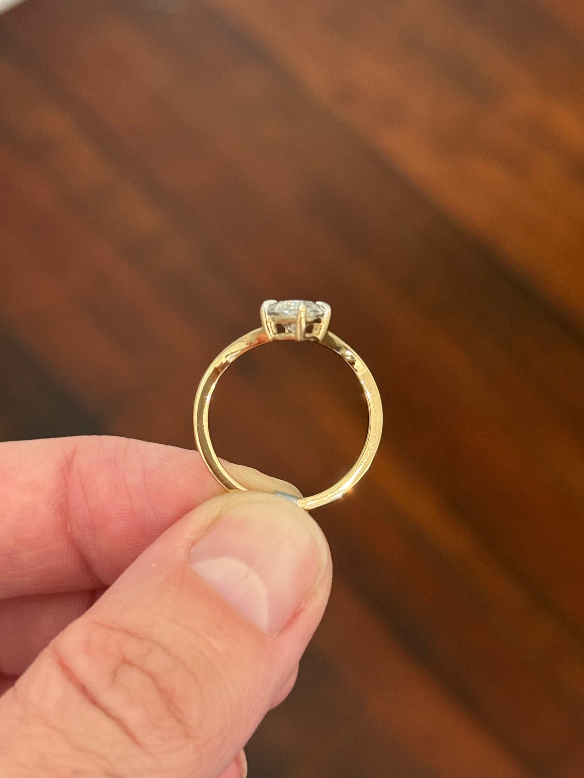 Yellow gold 1.49ct marquise lab diamond ring. Prongs are white gold.