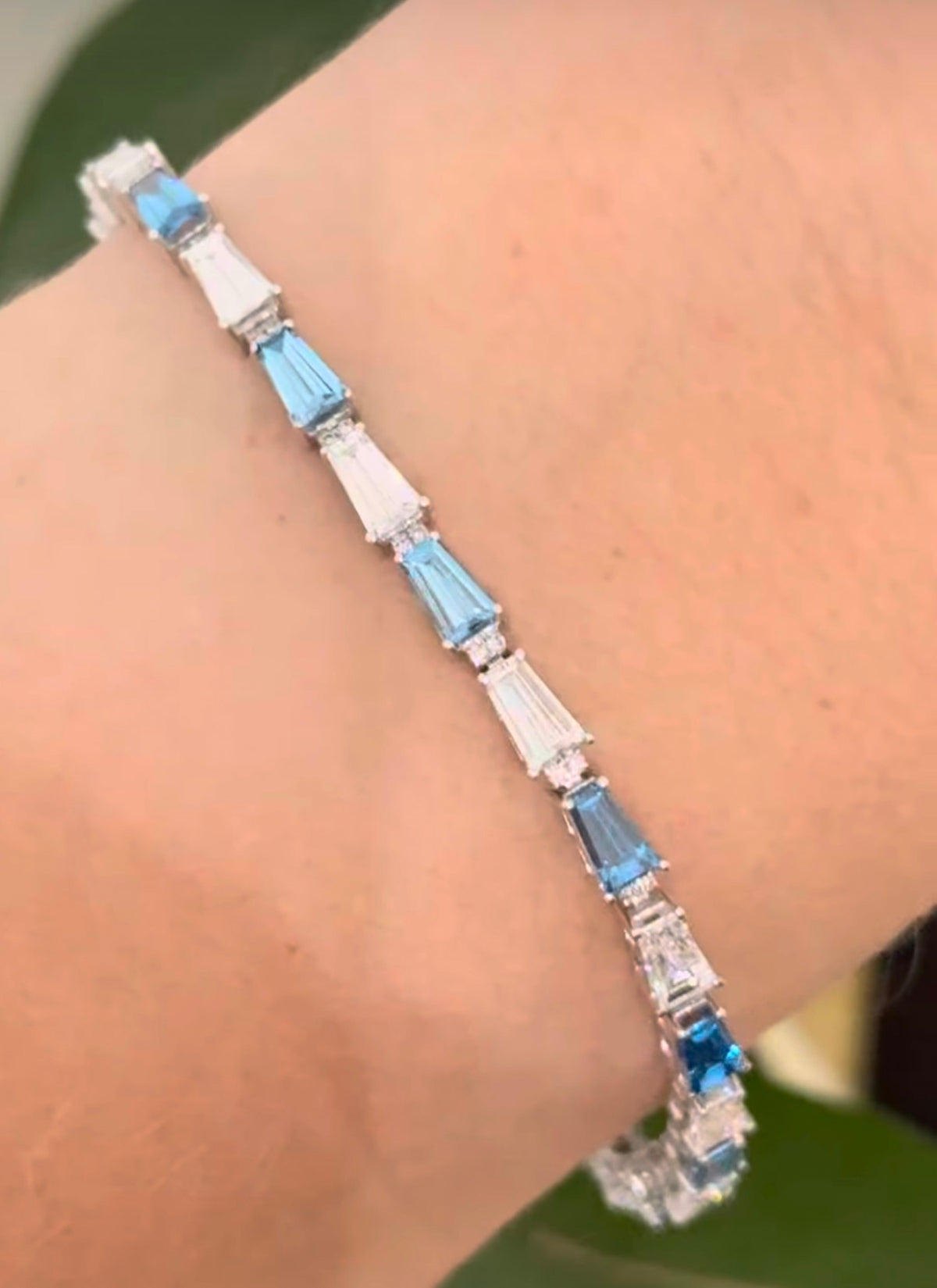 White gold 5.91ct tapered baguette blue and white lab diamond bracelet