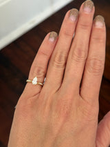 Size 3.75 IGI certified yellow gold pear and round lab diamond ring. Center stone is 0.58cts