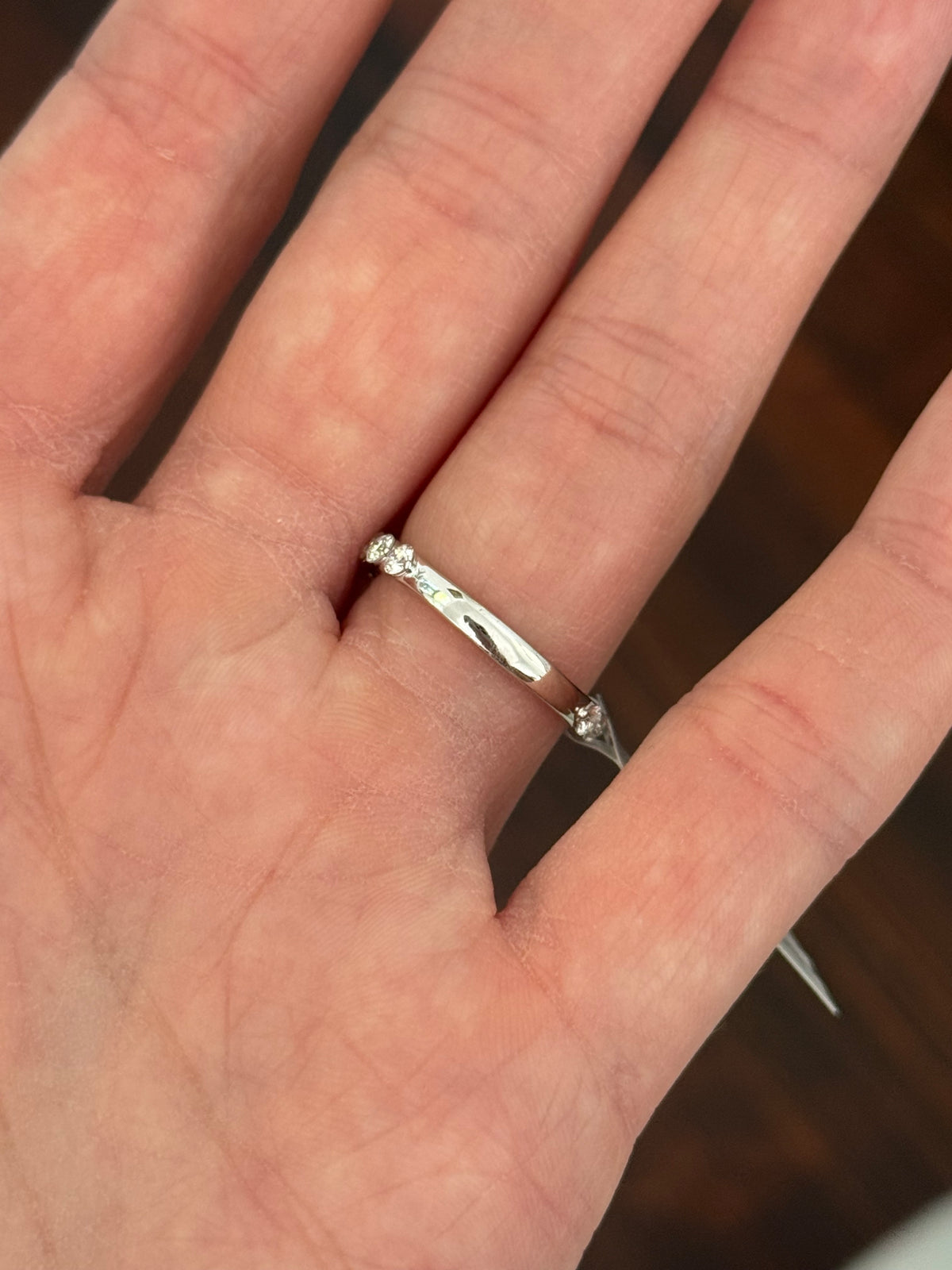 White gold pear shape and round lab diamond ring. Center stone is 1ct and approximately 9x5.3mm