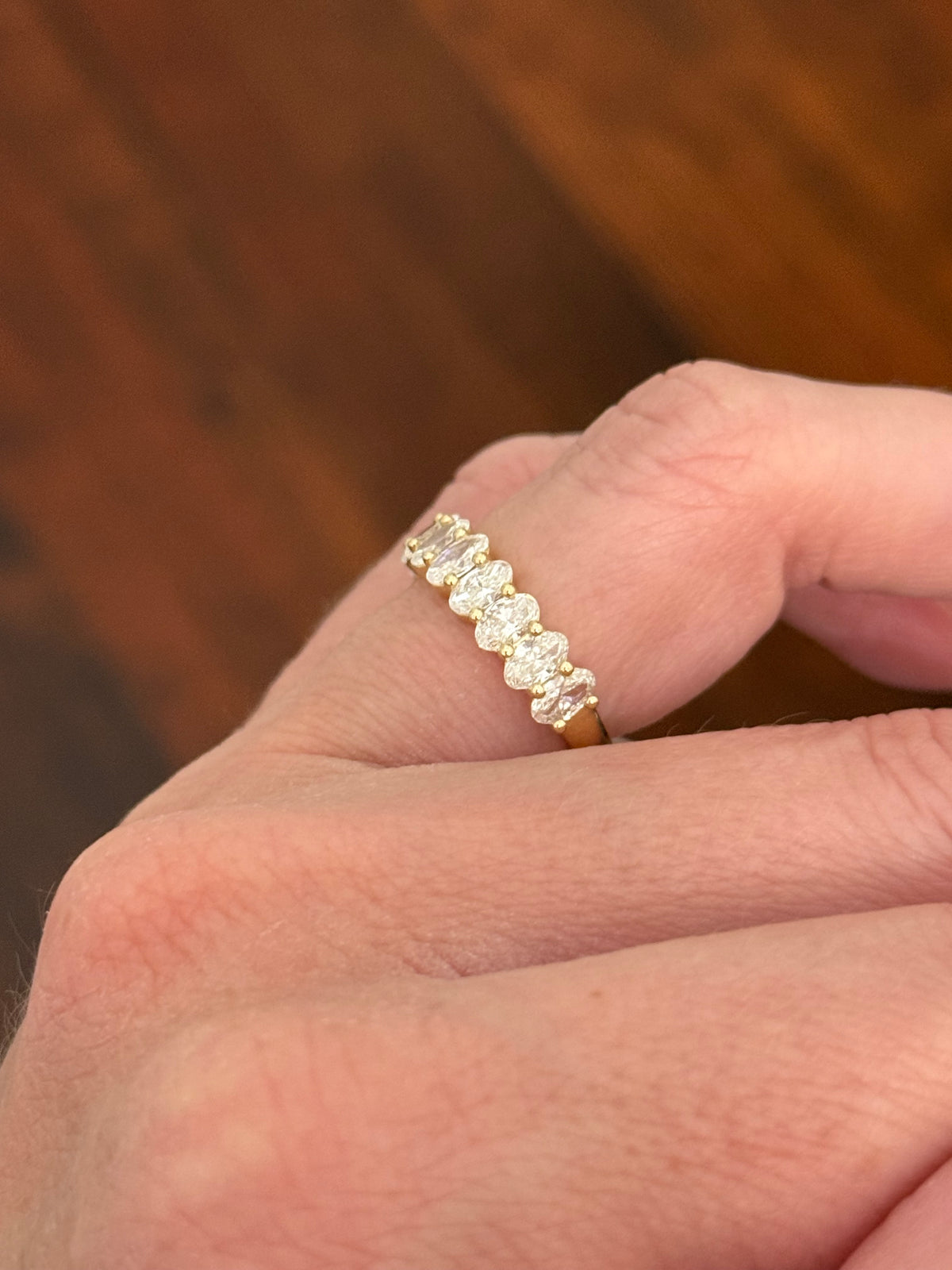 Yellow gold oval lab diamond band