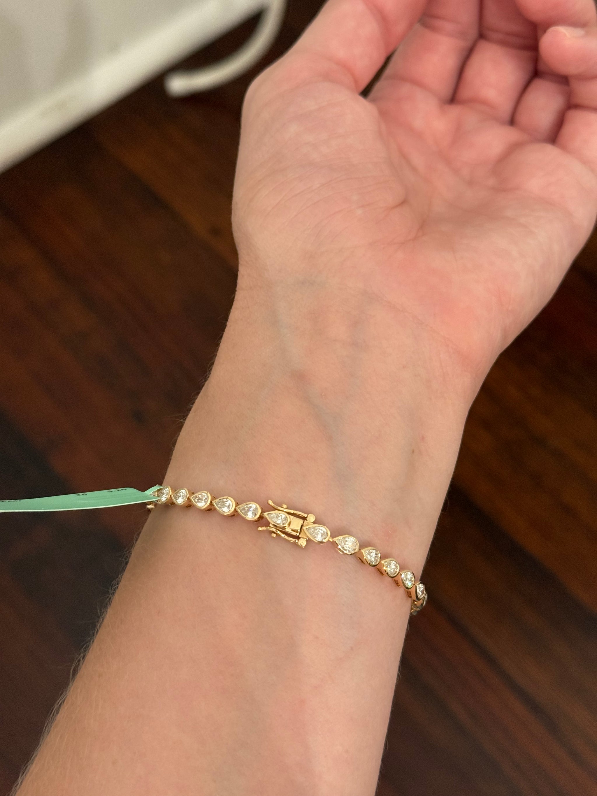 Yellow gold bezel set 5.28ct pear shape natural diamond bracelet