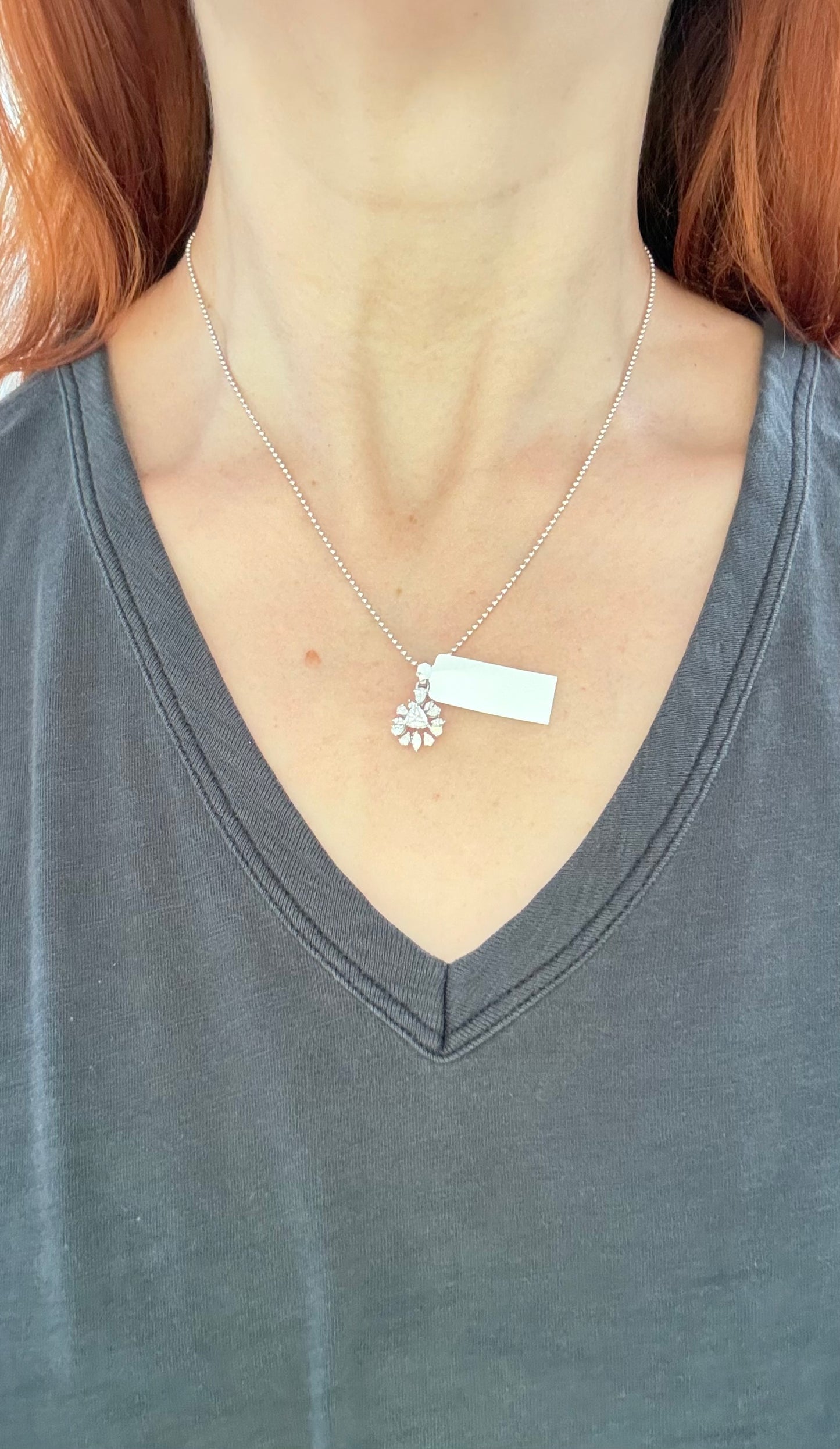 White gold trillion, pear shape and marquise lab diamond pendant. Center stone measures 5.1x5.5mm