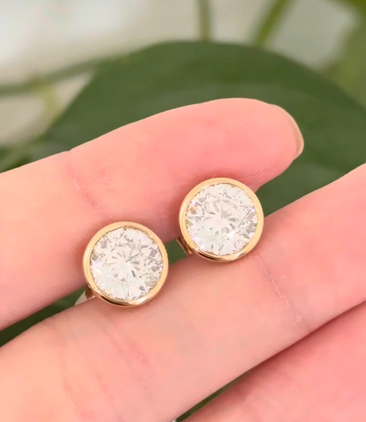 Yellow gold bezel set round lab diamond studs with pushback