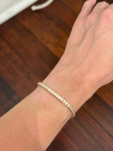 Yellow gold bezel set 5.15ct emerald cut natural diamond bracelet