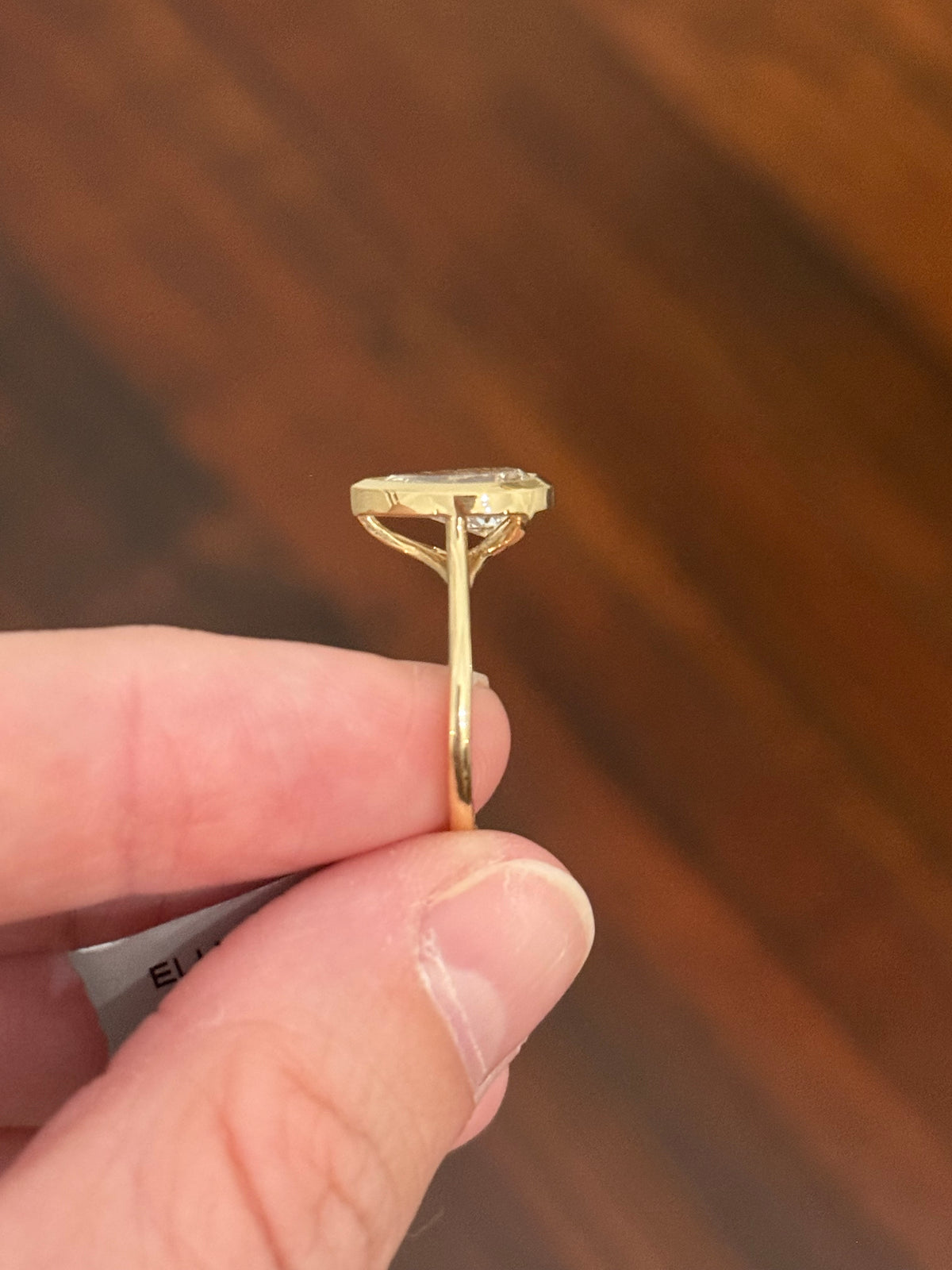 Yellow gold bezel set 1.96ct pear shaped lab diamond ring