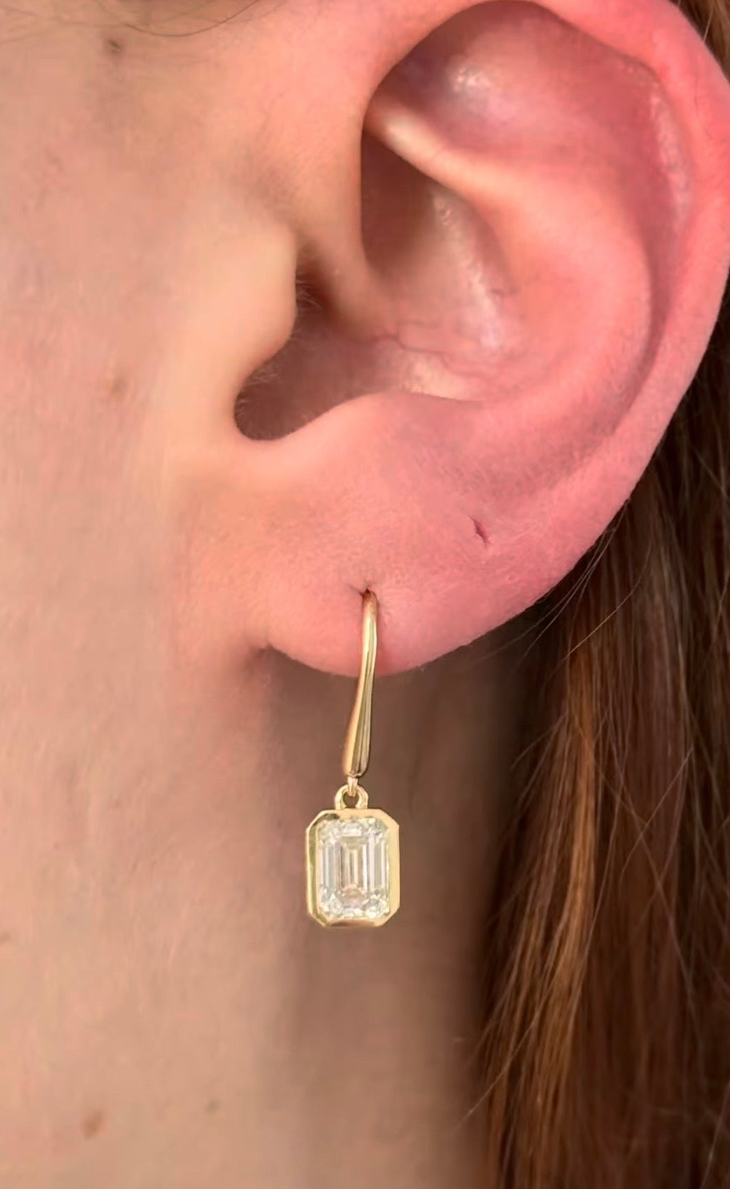Yellow gold emerald cut lab diamond hook back earrings