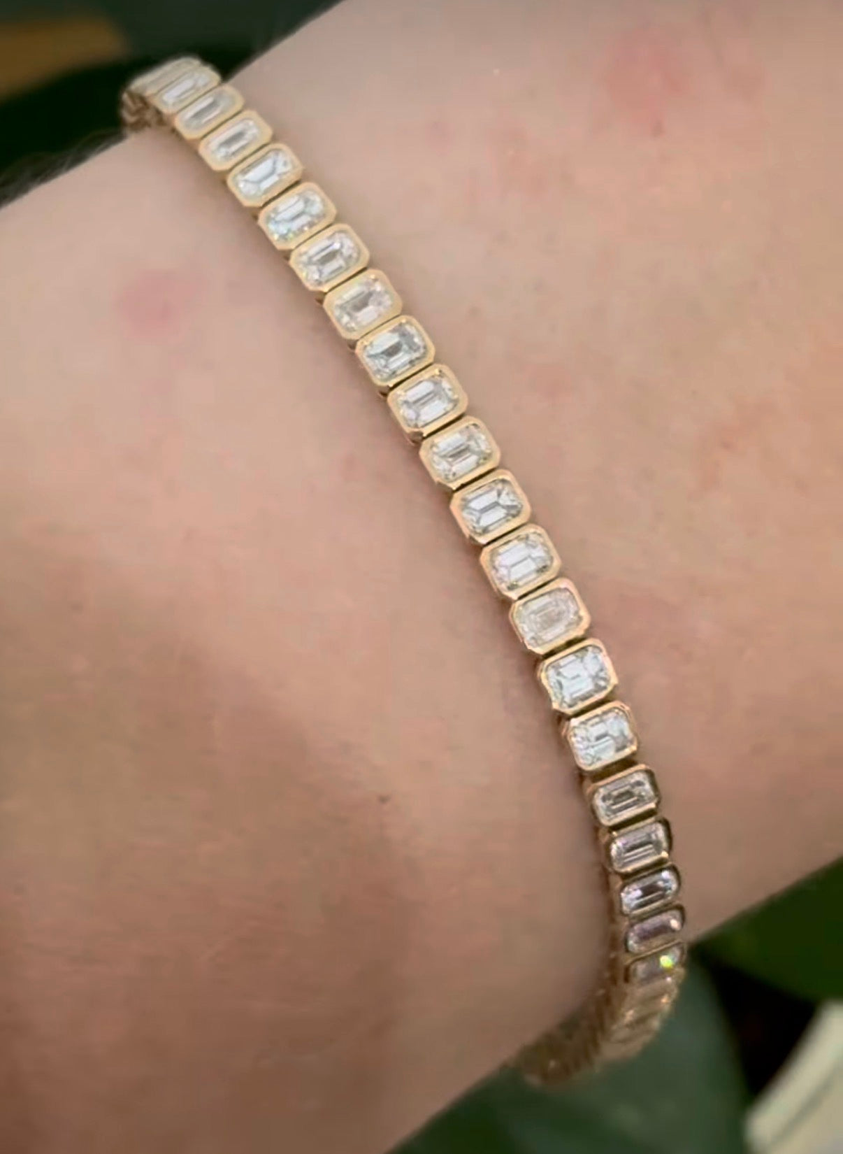 Yellow gold bezel set 5.15ct emerald cut natural diamond bracelet