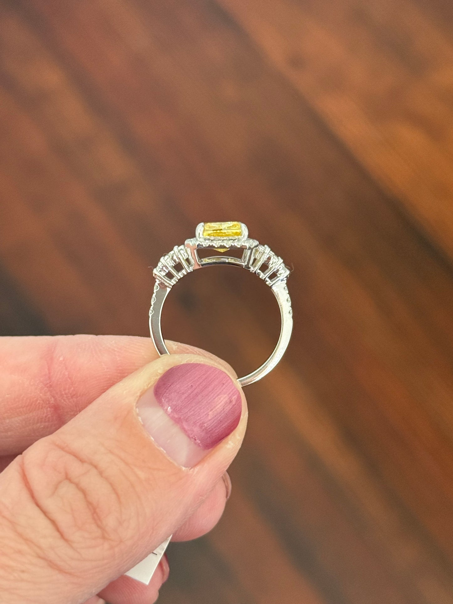 White gold radiant yellow lab diamond and baguette and round lab diamond ring
