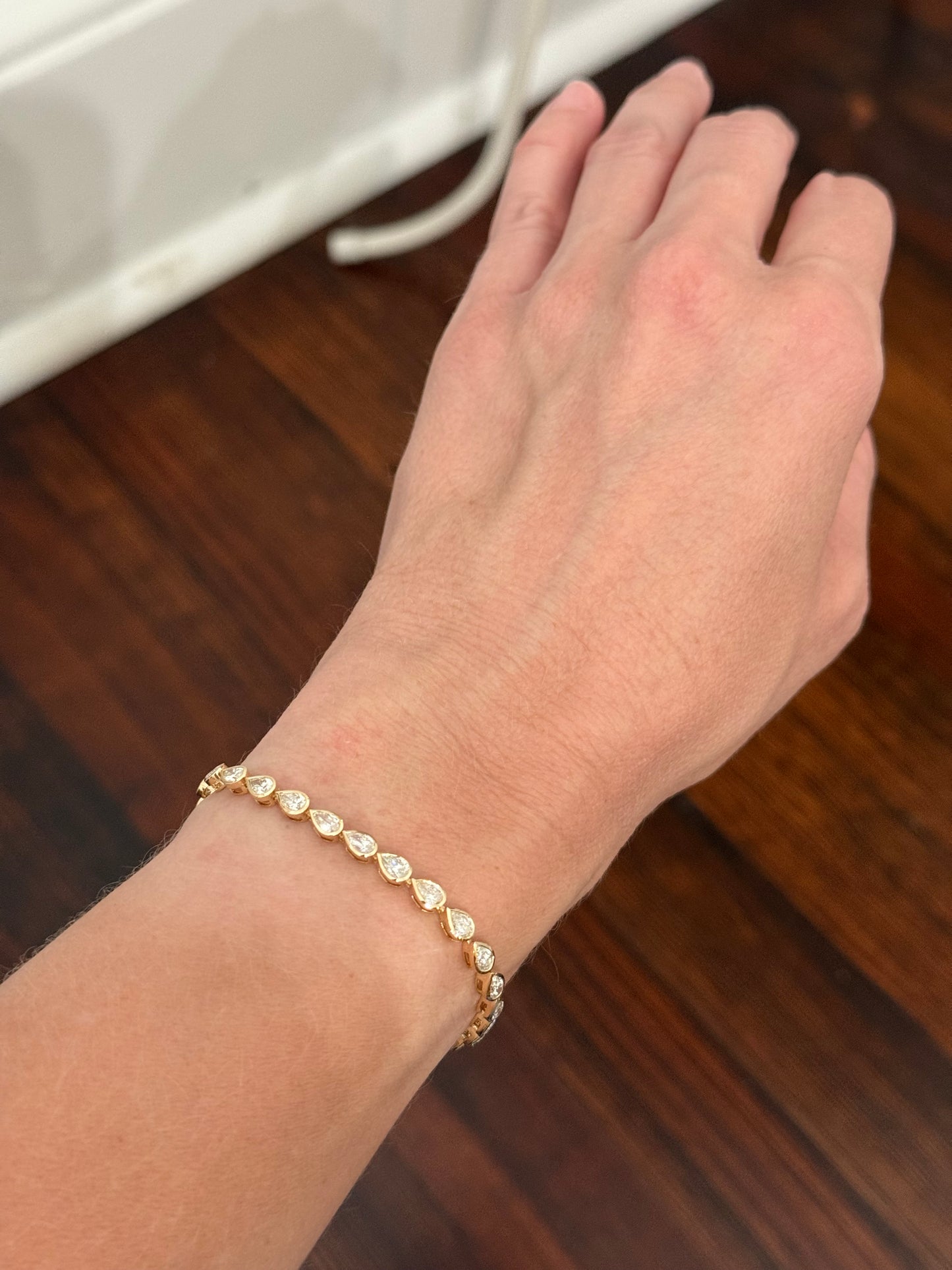 Yellow gold bezel set 5.28ct pear shape natural diamond bracelet