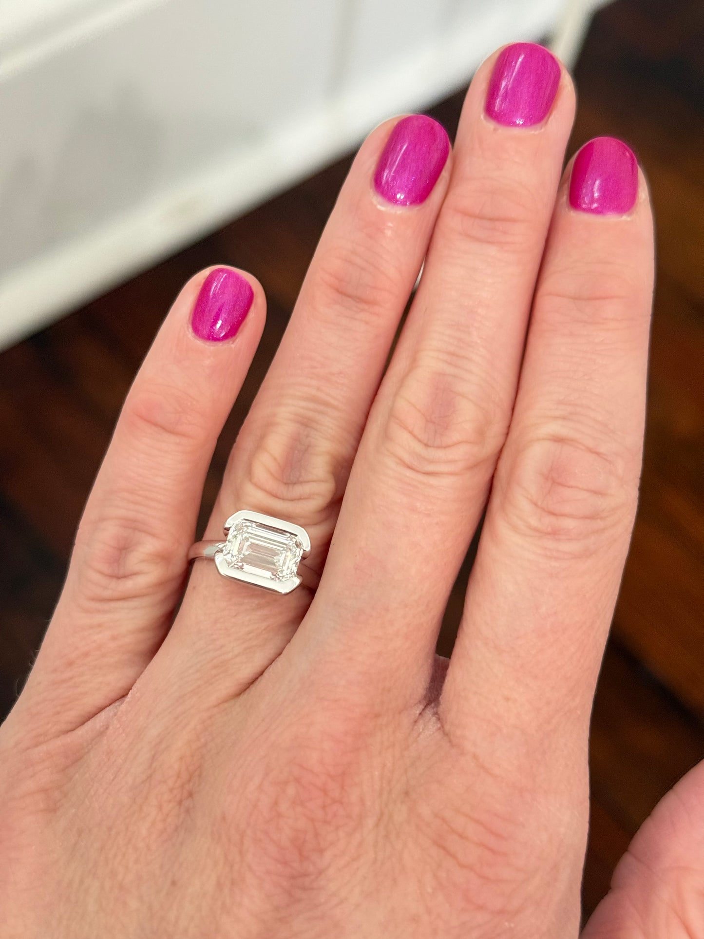 White gold east west set IGI certified 3ct emerald cut lab diamond ring