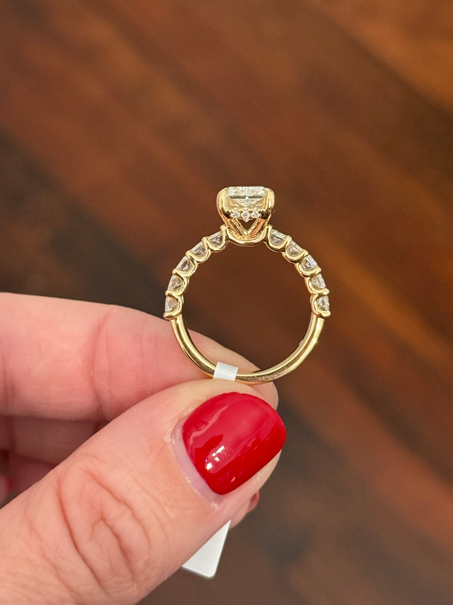 Yellow gold radiant lab diamond ring. Center stone is IGI certified and 3.01cts E VVS2