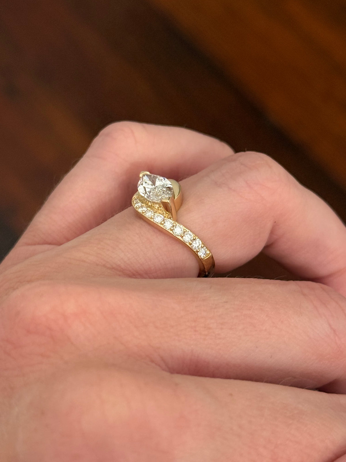 Yellow gold east west set marquise and round lab diamond ring. Marquise is IGI certified and 1.59cts E VS1