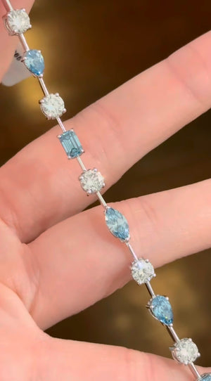 7.69 CTW White gold mixed shape bracelet