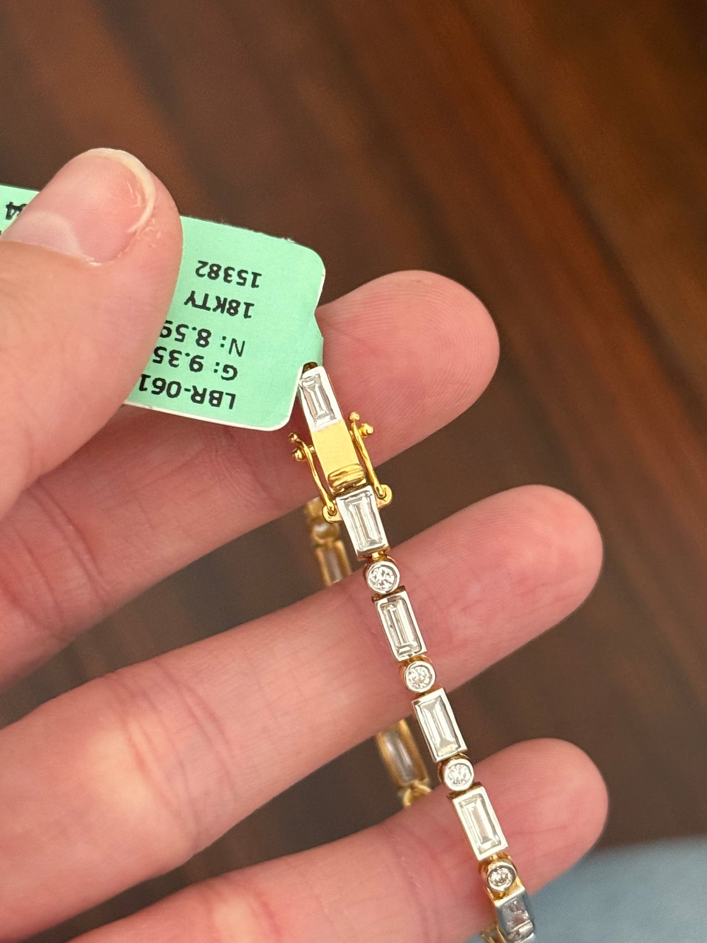 Yellow gold with white gold bezel setting 3.84ct baguette and round natural diamond bracelet