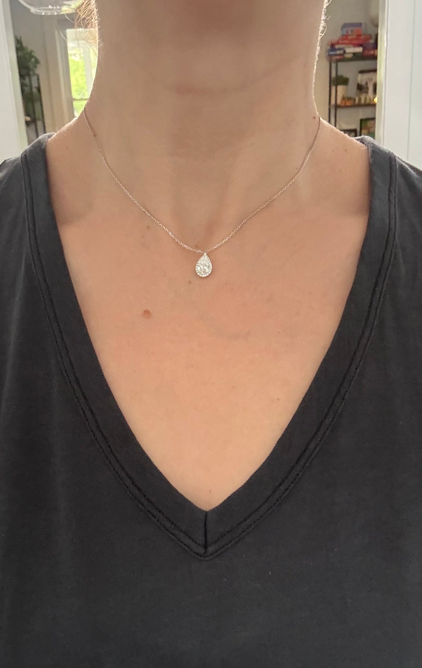 White gold pear shaped lab diamond necklace. Center stone is 1.07cts and measures 8.6x5.2mm.  Chain is 16” with an adjustment of 4” to make as long as 20”.