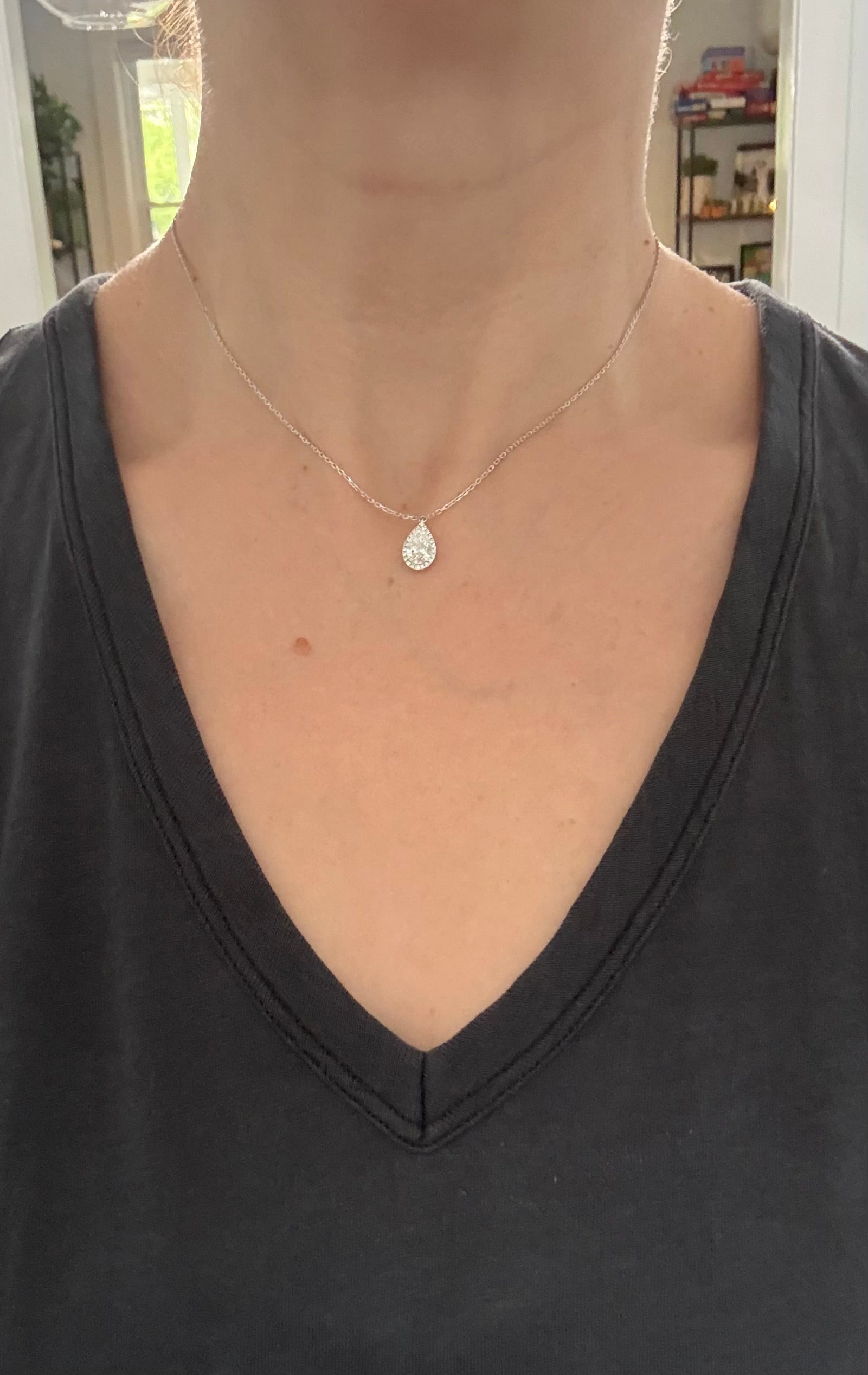 White gold pear shaped lab diamond necklace. Center stone is 1.07cts and measures 8.6x5.2mm.  Chain is 16” with an adjustment of 4” to make as long as 20”.