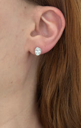 White gold bezel set oval lab diamond stud earrings