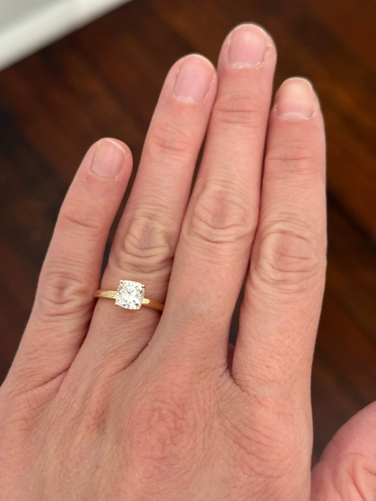 IGI certified cushion cut lab diamond ring. Center stone is 1.4cts
