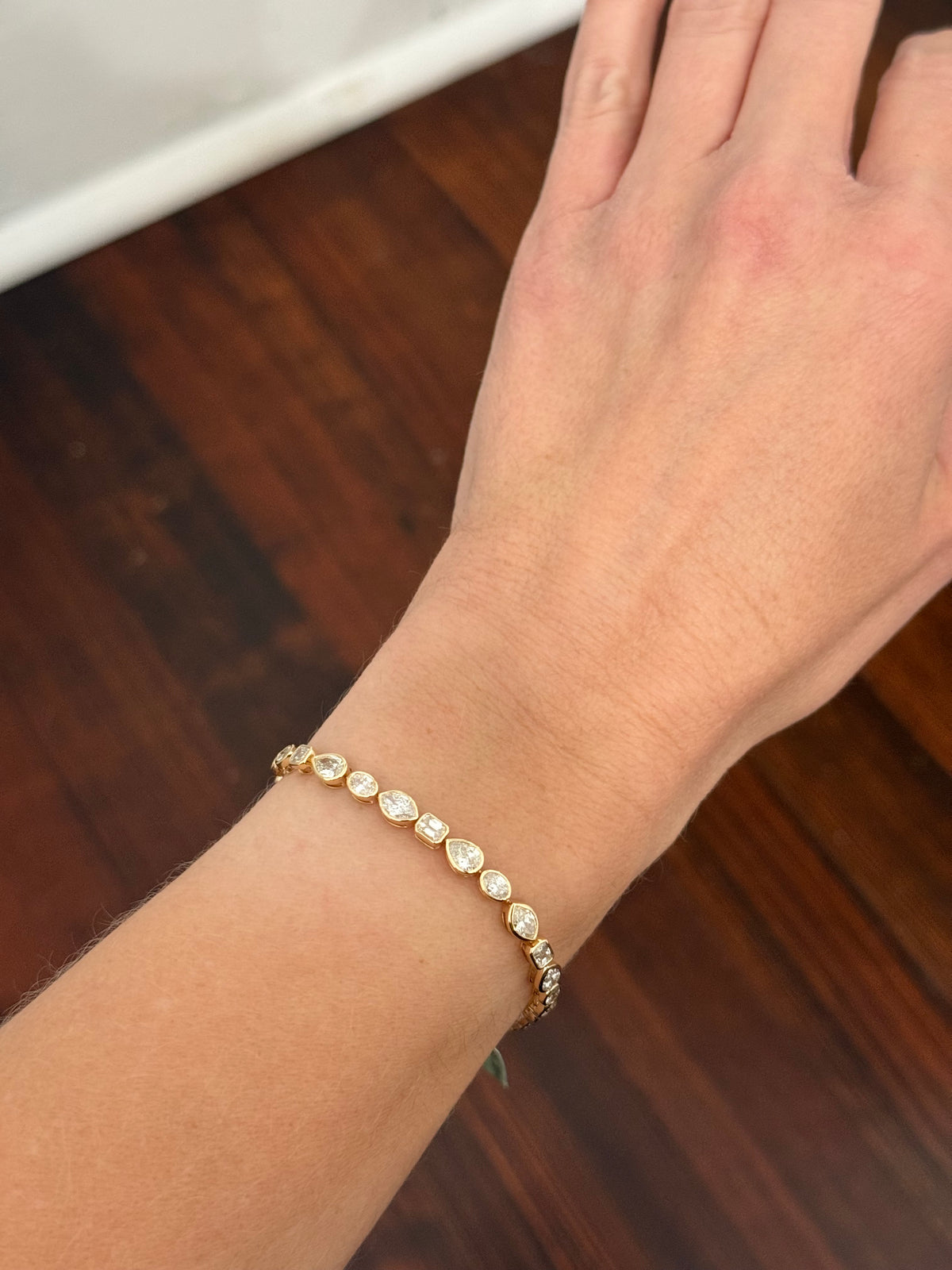 Yellow gold bezel set 7.58ct marquise, oval, emerald cut and pear shape natural diamond bracelet