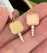 Natural diamond key pendants available in yellow or rose gold