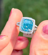 White gold cushion cut blue lab diamond and white lab diamond ring