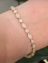 Yellow gold bezel set 4.36ct marquise and oval natural diamond bracelet