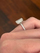 IGI certified emerald cut and round lab diamond ring. Center stone is 5.06cts