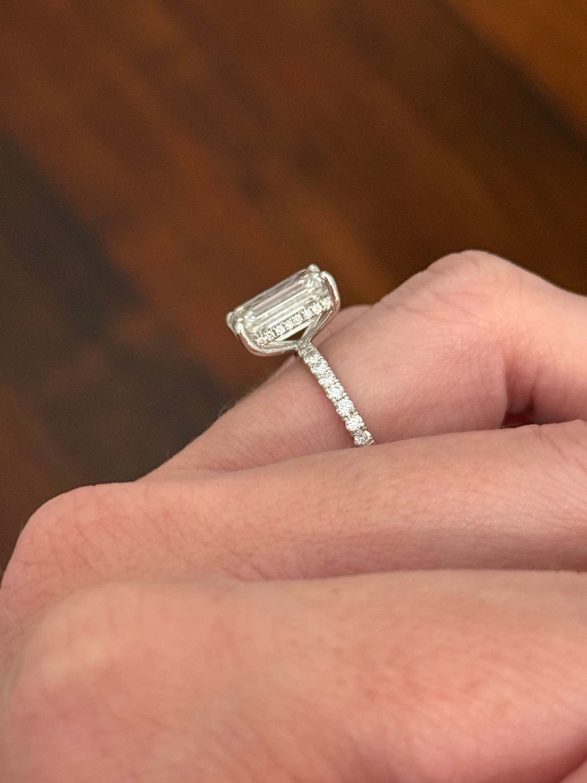 IGI certified emerald cut and round lab diamond ring. Center stone is 5.06cts