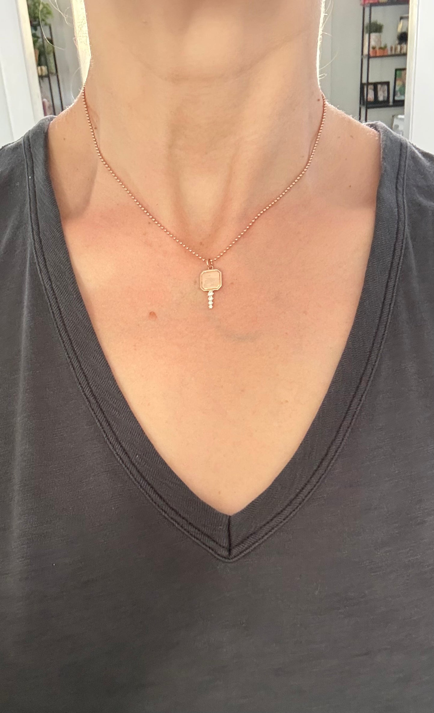 Natural diamond key pendants available in yellow or rose gold