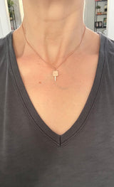 Natural diamond key pendants available in yellow or rose gold