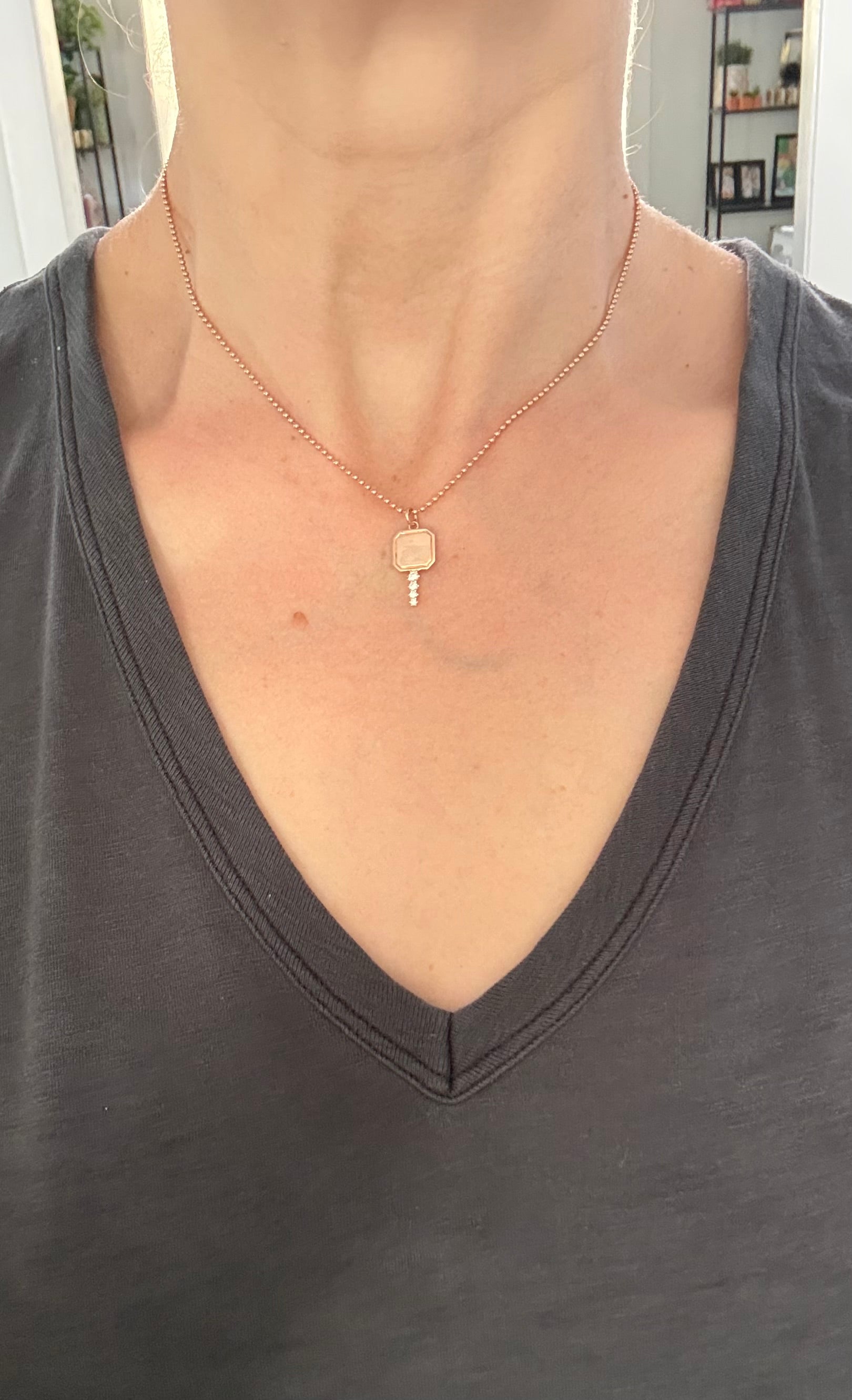 Natural diamond key pendants available in yellow or rose gold