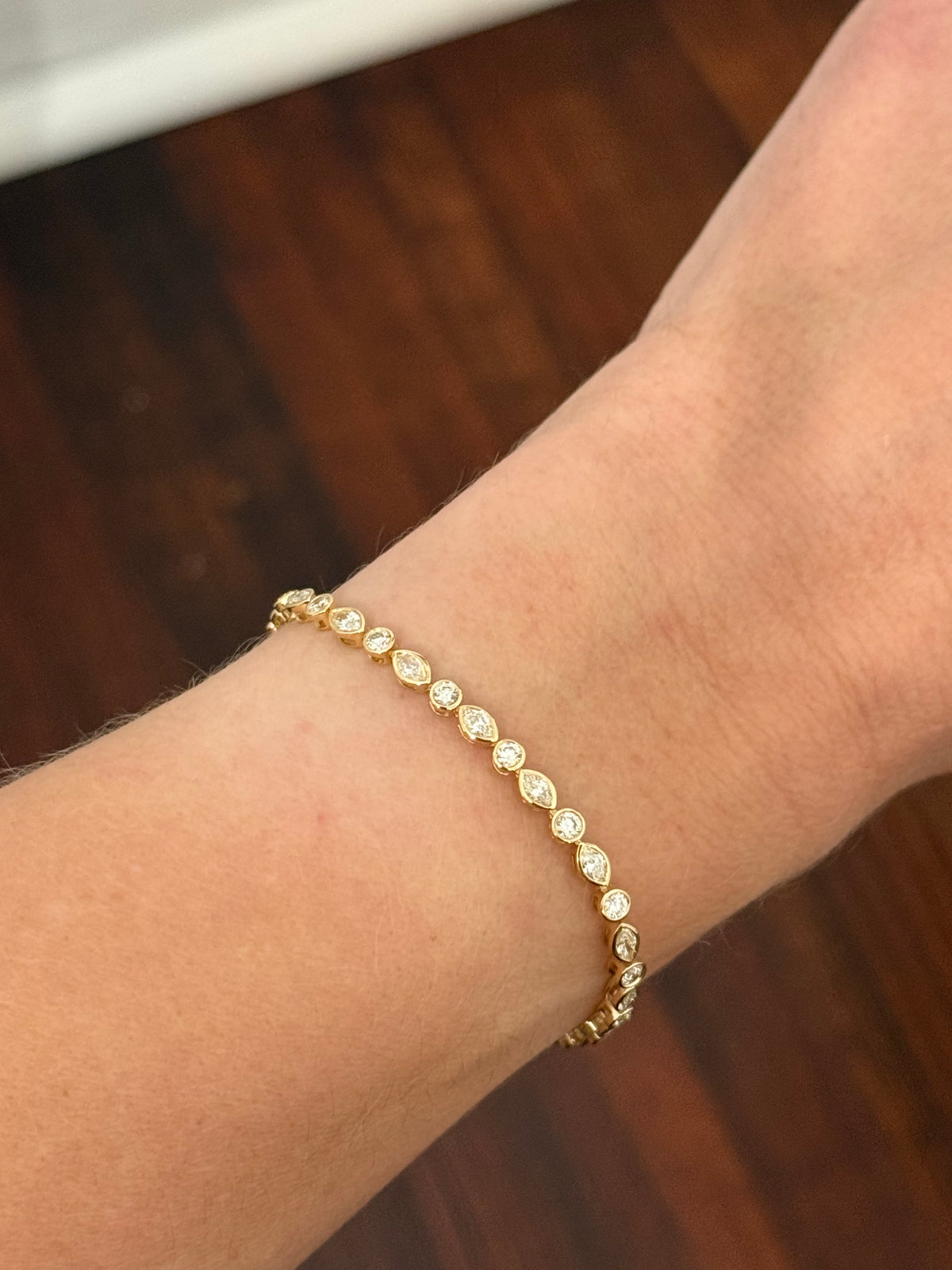 Yellow gold bezel set 3.45ct marquise and round natural diamond bracelet