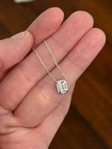 White gold emerald cut lab diamond necklace. Center stone is 0.50cts and measures 5.2x3.7mm. Chain is 16” with an adjustment of 4” to make as long as 20”.