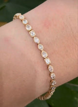 Yellow gold bezel set 4.62cts oval, marquise, pear shape and emerald cut natural diamond bracelet