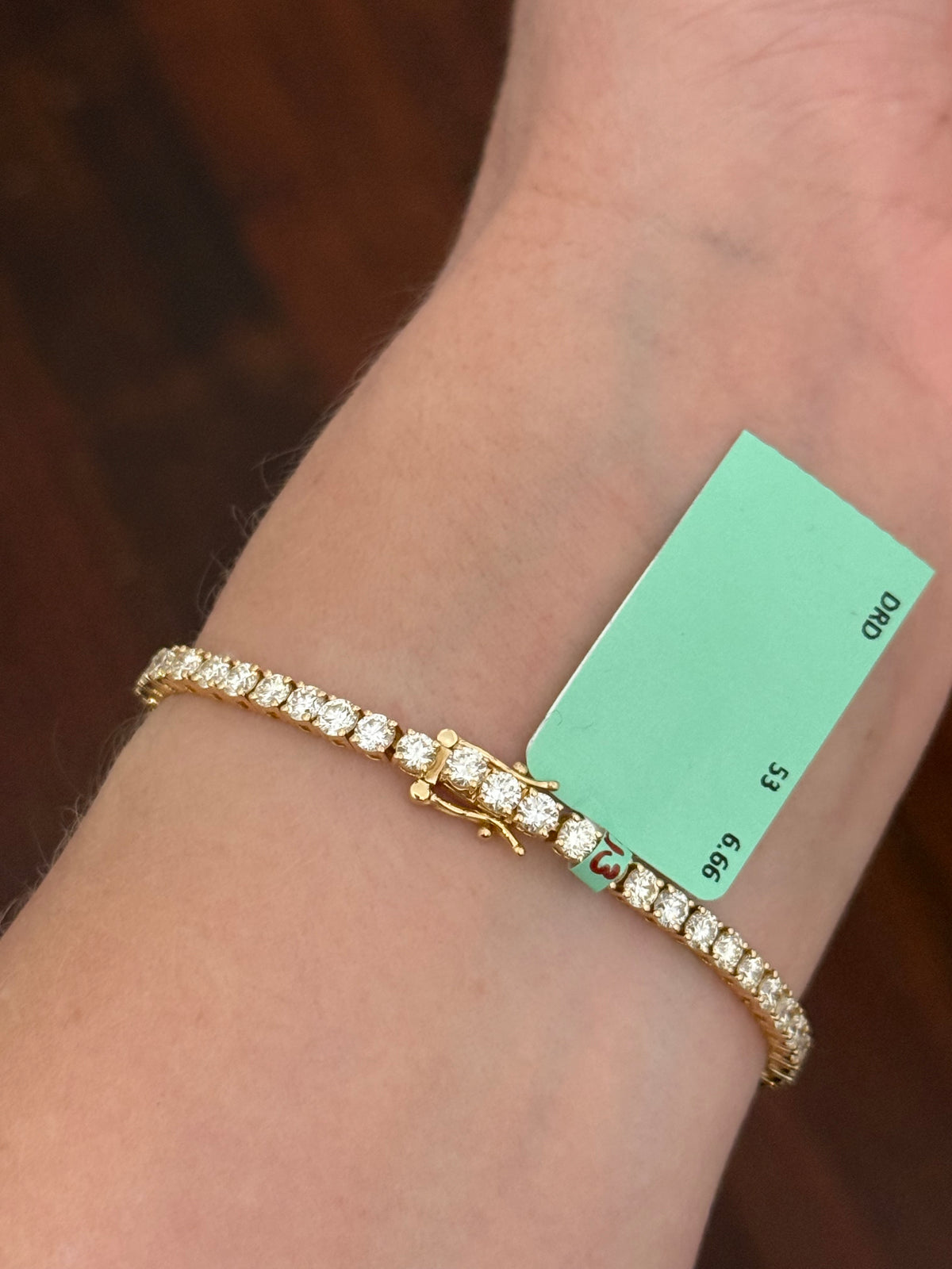 Yellow gold 4 prong 6.66ct natural diamond tennis bracelet