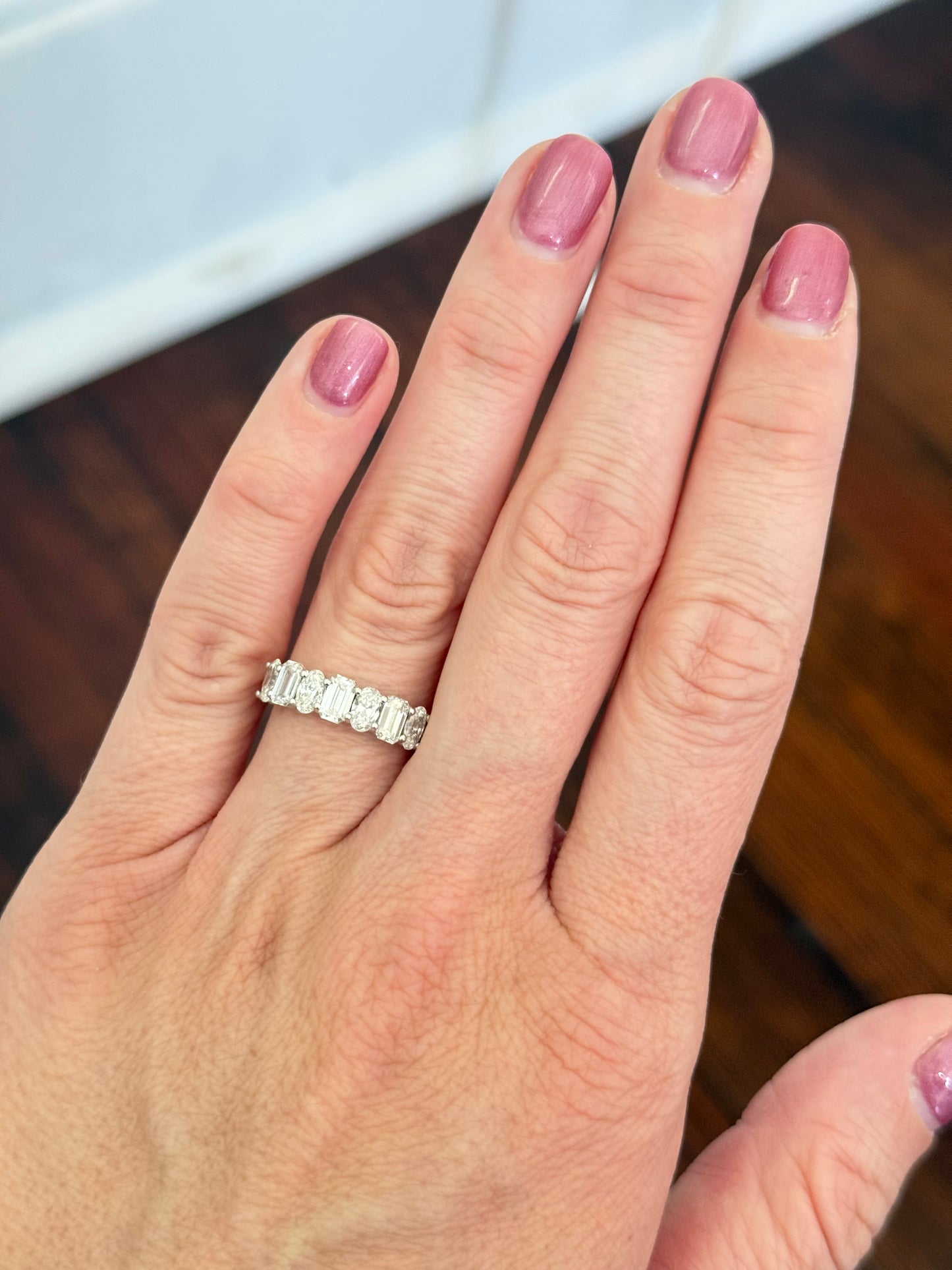 White gold emerald cut and oval lab diamond band